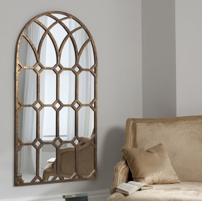 How white arch mirror can be ideal in use at home decor